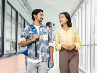 Student Walking in Hallway at MIT Nepal